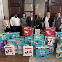Balch & Bingham Lawn Firm with donated diapers for MLK, Jr.'s Day of Service, Jan 2026